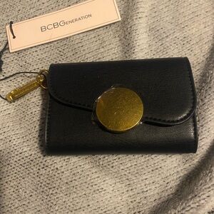 BCBGeneration Black Wallet with Gold Disc Detail